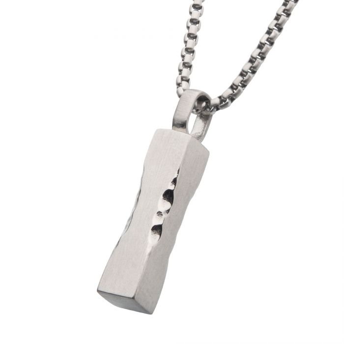 The INOX Matte Steel Chiseled Engravable Drop Pendant features a rectangular design in silver matte steel with a slightly uneven and textured surface, hanging elegantly from a silver box chain necklace. Perfect for adding a personal touch through engraving.