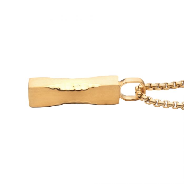 A close-up image of the INOX Matte 18K Gold IP Chiseled Engravable Drop Pendant featuring a rectangular, hammered-texture design attached to a box chain. The pendant, with its slightly irregular, rustic surface, hangs vertically from the chain against a white background.