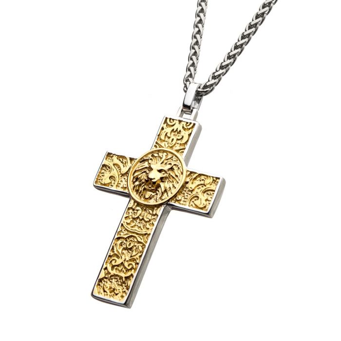 The Stainless Steel Gold Plated Nymeria Lion Cross Pendant by INOX features a men's stainless steel pendant with a gold-toned ornate cross that boasts intricate floral designs and a central round emblem showcasing a detailed lion's head. This exquisite piece gracefully hangs from a sleek, 24-inch steel wheat chain.